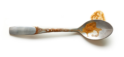 Image showing dirty coffee spoon