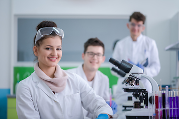 Image showing Group of young medical students doing research