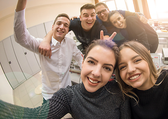 Image showing young happy students doing selfie picture