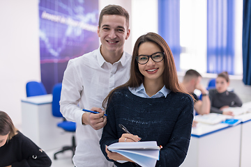 Image showing young students writing notes