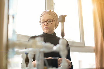 Image showing portrait of muslim female student in the electronic classroom