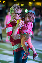 Image showing mother and little daughter in the kids disco