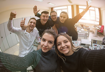 Image showing young happy students doing selfie picture