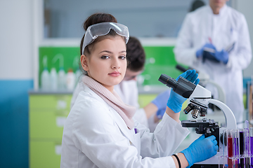 Image showing Group of young medical students doing research