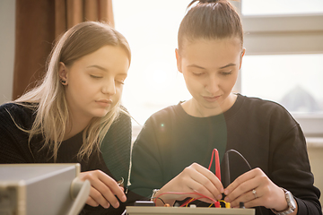 Image showing students doing practice in the electronic classroom