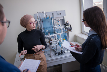 Image showing young students doing practice in the electronic classroom