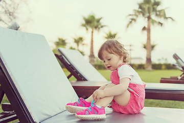 Image showing little cute girl enjoying summer vacations