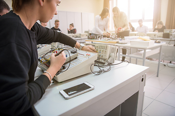 Image showing students doing practice in the electronic classroom