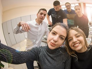 Image showing young happy students doing selfie picture