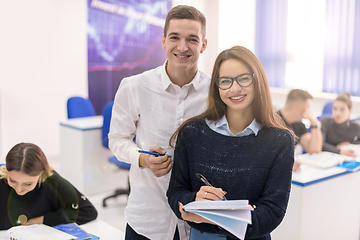 Image showing young students writing notes