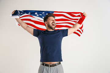 Image showing Young man with the flag of United States of America