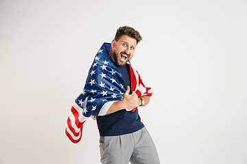 Image showing Young man with the flag of United States of America