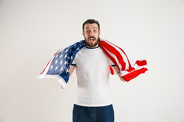 Image showing Young man with the flag of United States of America