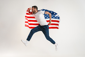 Image showing Young man with the flag of United States of America