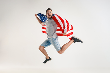 Image showing Young man with the flag of United States of America