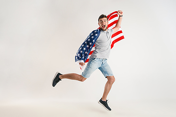 Image showing Young man with the flag of United States of America