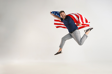 Image showing Young man with the flag of United States of America