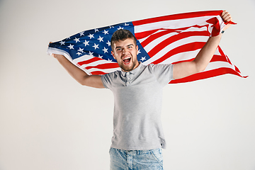 Image showing Young man with the flag of United States of America