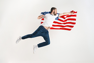 Image showing Young man with the flag of United States of America