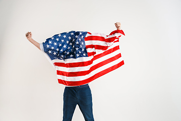 Image showing Young man with the flag of United States of America