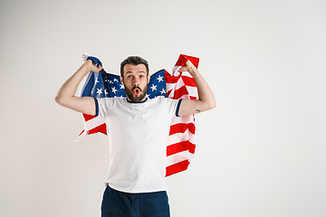 Image showing Young man with the flag of United States of America