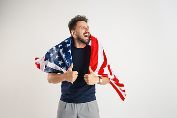 Image showing Young man with the flag of United States of America