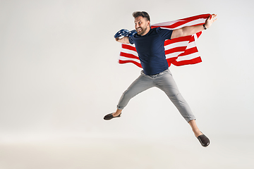 Image showing Young man with the flag of United States of America