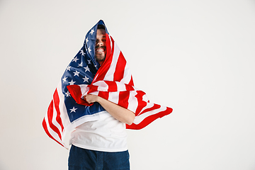 Image showing Young man with the flag of United States of America