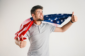 Image showing Young man with the flag of United States of America