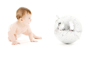 Image showing adorable baby boy with big disco ball