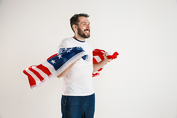 Image showing Young man with the flag of United States of America