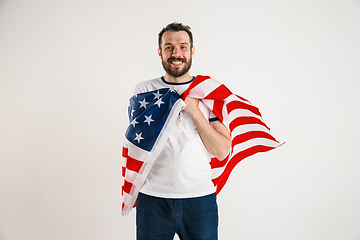 Image showing Young man with the flag of United States of America