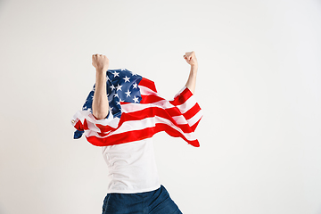 Image showing Young man with the flag of United States of America