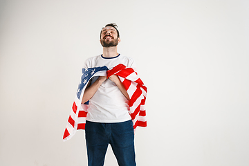 Image showing Young man with the flag of United States of America