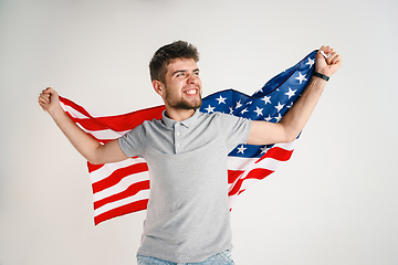 Image showing Young man with the flag of United States of America