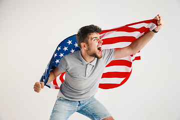 Image showing Young man with the flag of United States of America