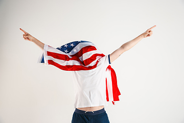 Image showing Young man with the flag of United States of America