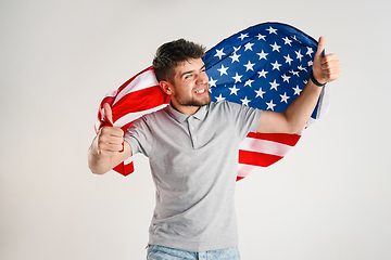 Image showing Young man with the flag of United States of America