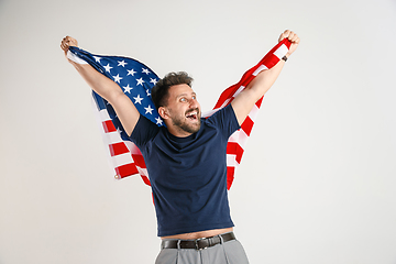 Image showing Young man with the flag of United States of America