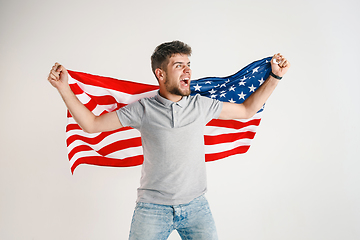 Image showing Young man with the flag of United States of America