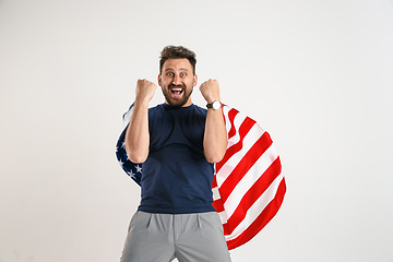 Image showing Young man with the flag of United States of America