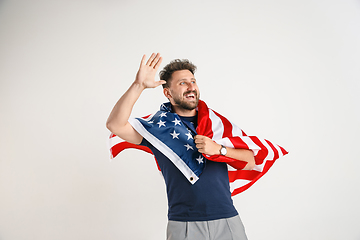 Image showing Young man with the flag of United States of America