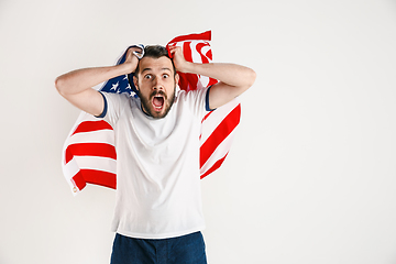 Image showing Young man with the flag of United States of America