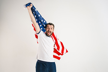 Image showing Young man with the flag of United States of America