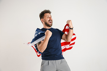 Image showing Young man with the flag of United States of America