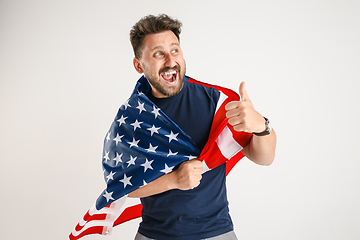 Image showing Young man with the flag of United States of America