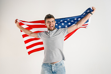 Image showing Young man with the flag of United States of America