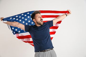 Image showing Young man with the flag of United States of America