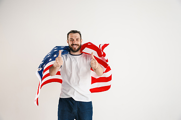 Image showing Young man with the flag of United States of America