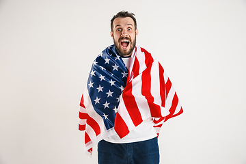 Image showing Young man with the flag of United States of America